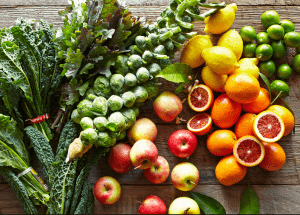 a group of fruits and vegetables on a wood surface Healthy Weight Loss Diets East Retford